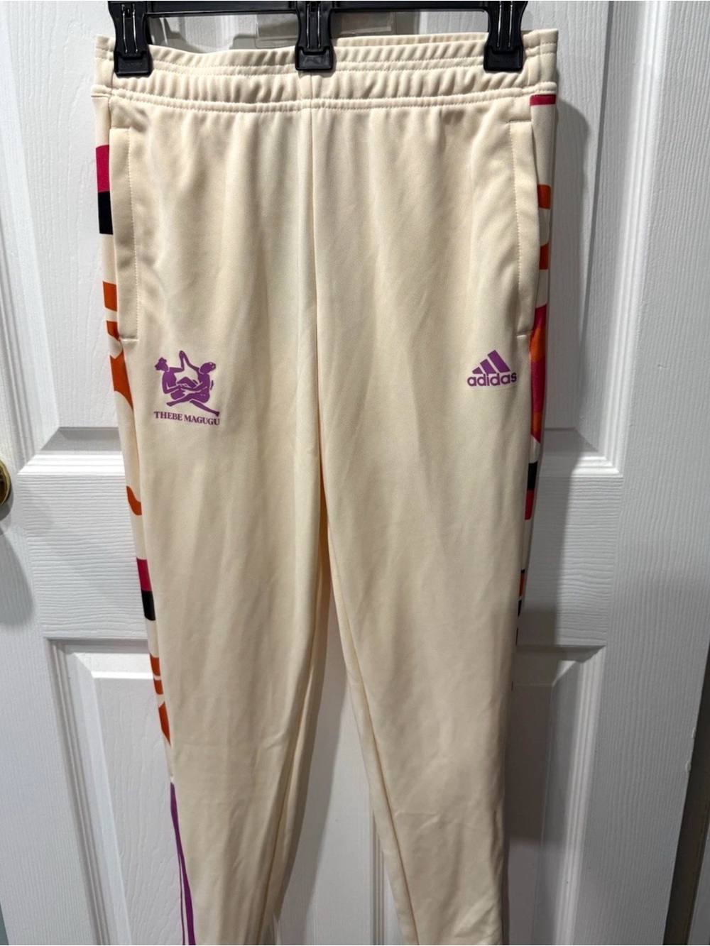 adidas Kids Cream Sweatpants with Purple Logo and Multicolor Side Stripes